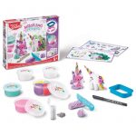 Create Magical Animals kit box with colourful dough pots, tools and glitter arranged neatly in front.